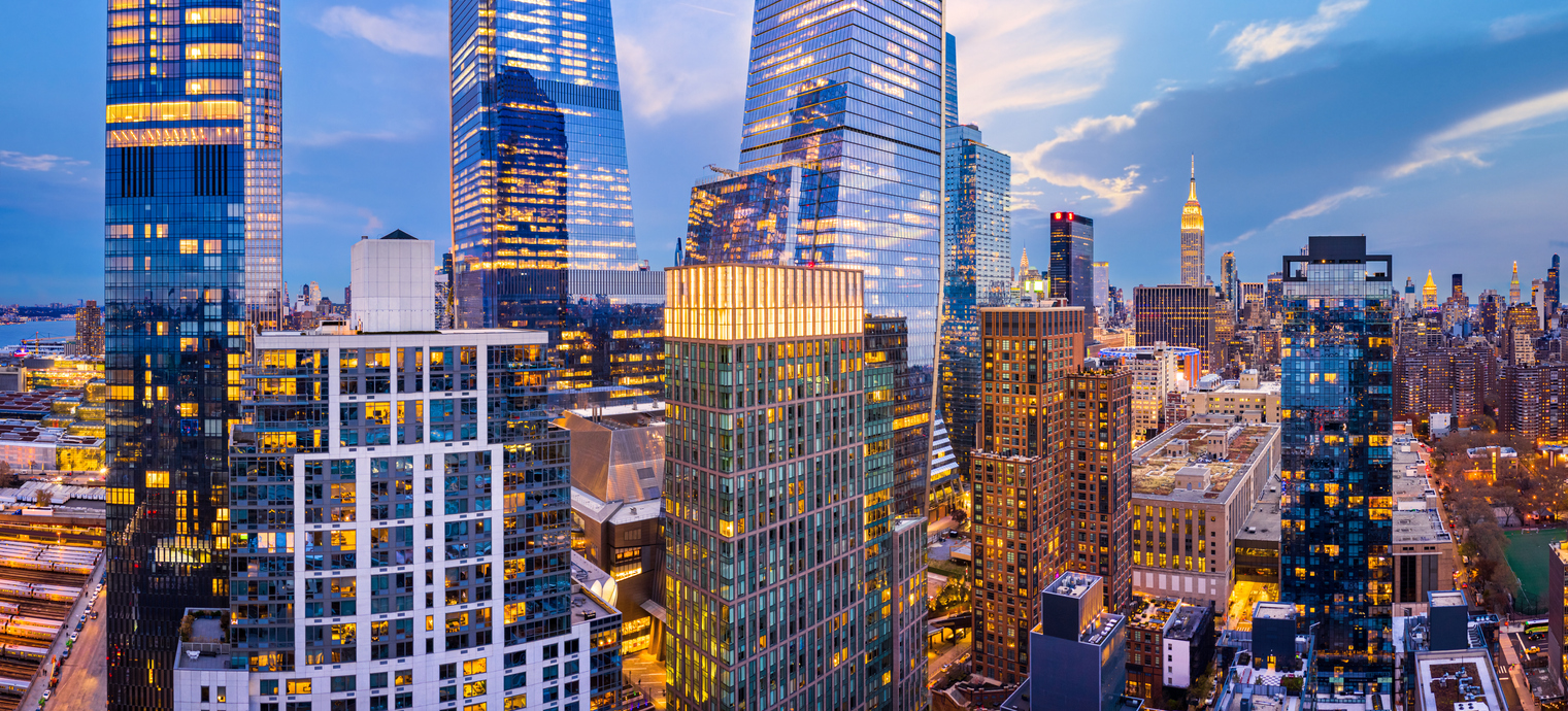 Aerial panorama of New York City skyscrapers at dusk International