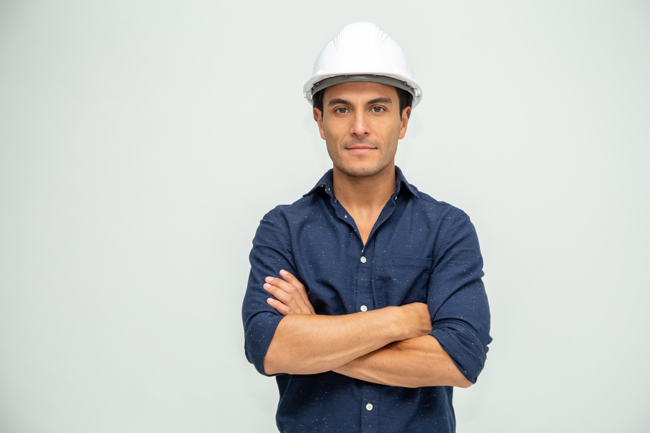 Handsome man industrial engineer wearing a white helmet solated on white background Project Engineer